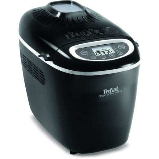 Mașină de pâine TEFAL Bread of the World PF611838  19 programe  1600W  Cuvă 1.5kg  2 lame  Accesoriile brutarului  Păstrare la cald  Pornire întârziată  Fereastră  Carte cu 35 rețete