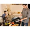 Grătar electric BRAUN MultiGrill 7 Contact CG7020 – 0X17900000, 2000W, Maximum 230°C, 3 moduri de gătire, 2 termostate electronice independente,1 placă grill, 1 placă griddle, G5.50kg