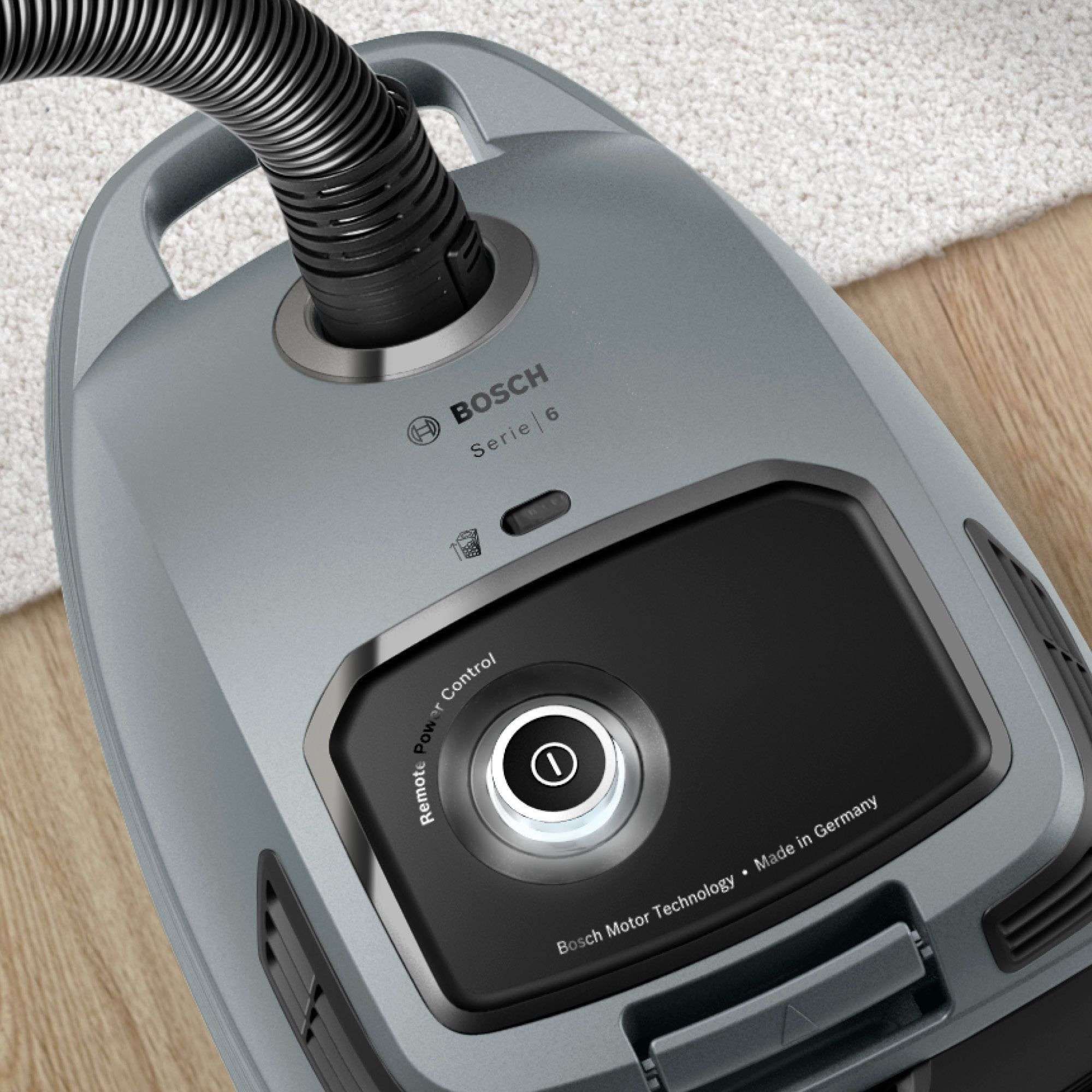 Aspirator cu sac BOSCH Serie 6 BGB6X330, Aspirare uscată, 600W, Sac 4l, Cablu 9.3m, 4 roți, Filtru igienic lavabil HEPA, Telecomandă mâner, Iluminare LED, Perie mobilier, Perie parchet, 75dBA, G4.3kg, Graphite